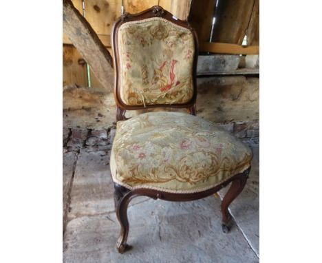 A SET OF 4 VICTORIAN WALNUT FRAMED SALON CHAIRS WITH OVERSTUFFED TAPESTRY SEATS AND BACKS, CABRIOLE LEGS AND CASTERS  (please