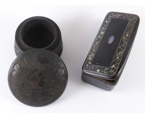 PAPIER MACHE SNUFF BOX AND A BOG OAK TYPE TREEN DITTO WTH CLOVER LEAF DECORATION