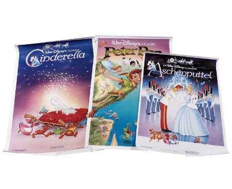 A collection of Disney movie posters, comprising: a Walt Disney’s Classic Peter Pan movie poster, 104 x 69cms, unframed; a Wa