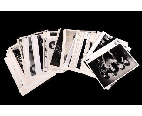 Record label promotional black and white photographs of bands and musicians, from Big Life, RAK, Island, EMI, and more, notab