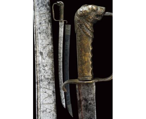 dating: late 18th Century provenance: Italy, Curved, single-and-false-edged blade with groove under the back, inscription 'VI