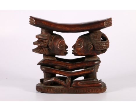 Democratic Republic of Congo, Luba Shankadi headrest with decorated ends to the rest, supported by two female figures, 19cm x