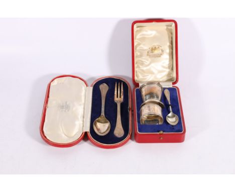 George V silver christening set with egg cup, spoon and napkin ring by Hamilton and Inches Birmingham 1935/36, 73g in fitted 