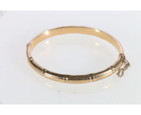 9ct yellow gold bamboo effect hinge bangle, maker JS Birmingham, 9.0g Conditon Report:Approximately 18cm internal diameter.St