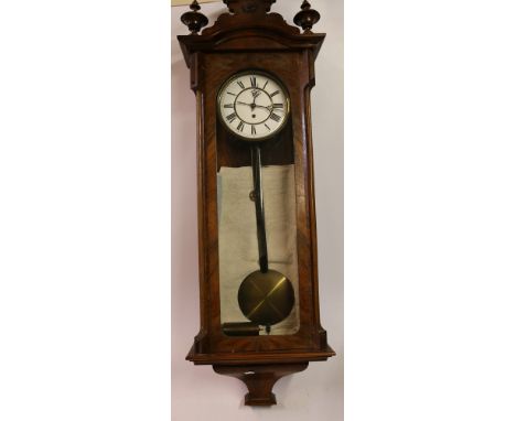 19th century walnut cased Vienna wall clock, the white enamel dial with Roman numeral chapter ring, 117cm tall 