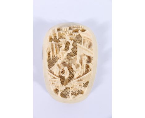 Chinese late 19th Century ivory carved and pierced oval panel deeply carved with figures in a pavilion landscape, 6.5 cm x 4.