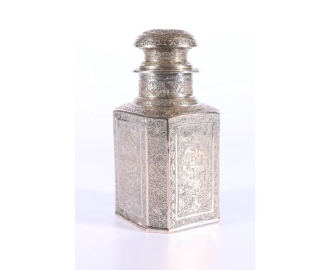 Persian silver tea caddy with domed top, the body of octagonal section decorated with animals, birds and scrolling foliage, 1
