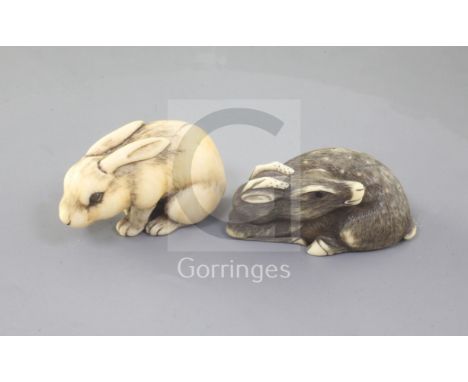 Two Japanese ivory netsuke of a hare and a recumbent deer, 18th/19th century, the hare with horn inset eyes, engraved two cha