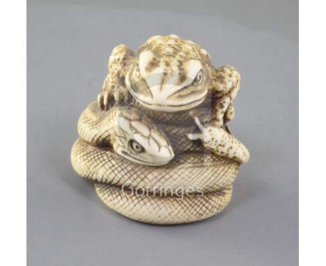 A Japanese ivory netsuke of the 'sansukumi' (snake, frog and snail), 19th century, signed, 4cmProvenance: purchased from Burn