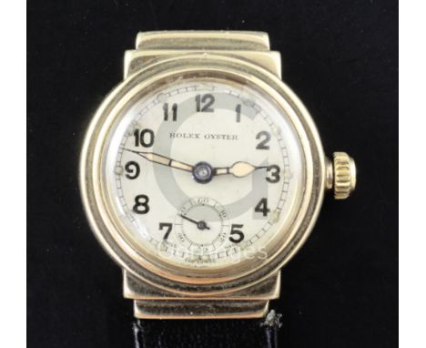 A gentleman's 1930's 9ct gold boy's size Rolex Oyster manual wind wrist watch, with Arabic dial and subsidiary seconds, the c