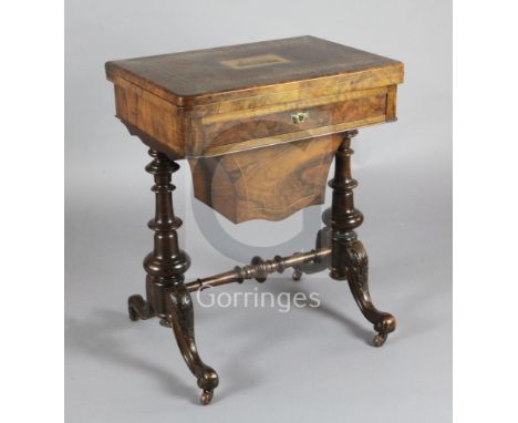 A Victorian figured walnut and Tunbridgeware combined games and work table, inset with a view of a castle, with folding lid r