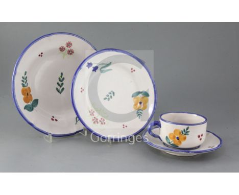 A modern thirty three piece Italian maiolica part tea service, painted with floral sprigs, consisting of ten cups, twelve sau