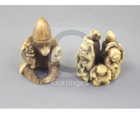Two Japanese ivory netsuke, 19th century, the first modelled as a monkey dressed as a priest and holding a mask, engraved two