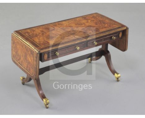 Denis Hillman. A Regency style banded burr walnut and rosewood banded miniature sofa table, fitted two small drawers over spl