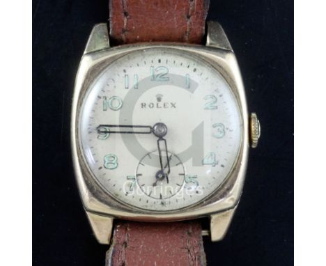 A gentleman's 1930's 9ct gold Rolex manual wind wrist watch, with Arabic dial and subsidiary seconds, the case back with engr