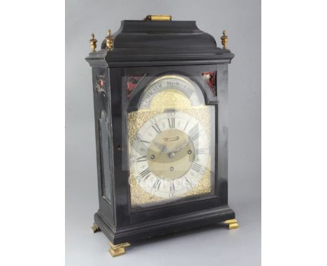 A second quarter of the 18th century and later quarter chiming table clock, the ebonised inverted bell top case with shaped s