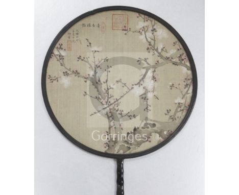 Two Chinese painted silk rigid circular fans, Guangxu period (1875-1908), the first painted with prunus blossom, the second w