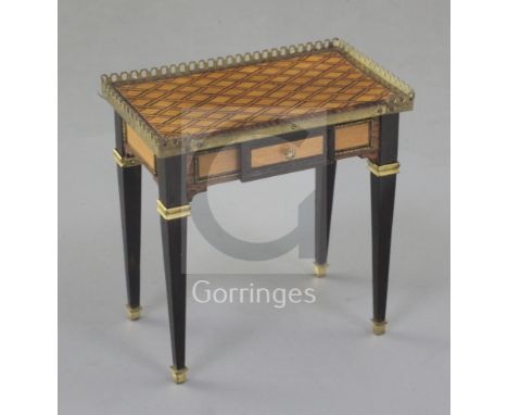 Denis Hillman. A Louis XVI style parquetry inlaid miniature table a ecrire, constructed of ten different woods, with a pierce