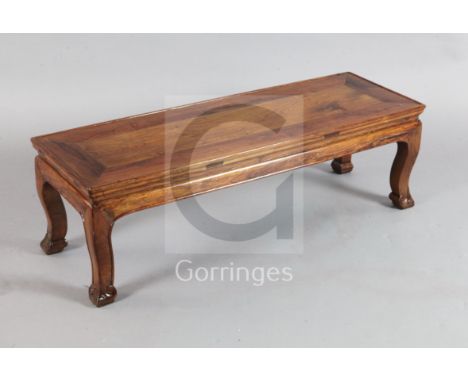 A Chinese huang huali kang table or bench, 17th century with later alterations, the rectangular tray top above a moulded frie