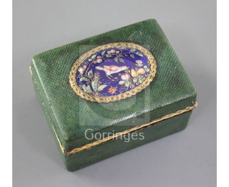 A late 18th century Continental shagreen snuff box the lid inset with an enamel plaque depicting a bird and fruit 2.25in.