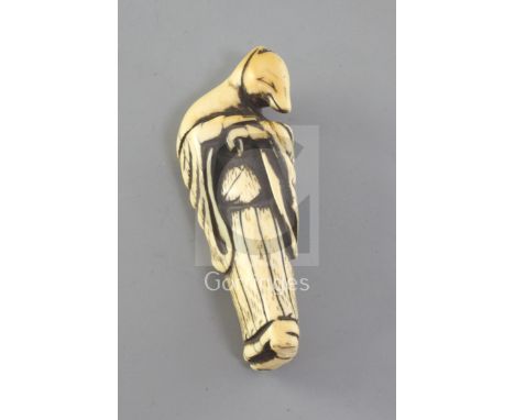 A Japanese fox-woman ivory netsuke, 18th century, carved as a fox masquerading as a woman, unsigned, 7.9cmProvenance: purchas