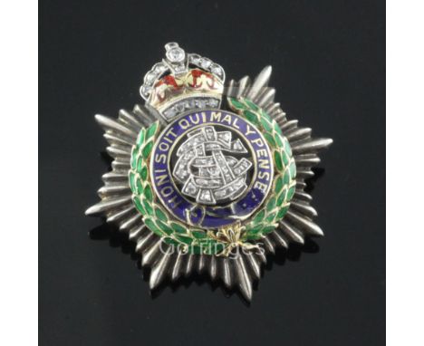An 18ct gold, diamond and three colour enamel Army Service Corps sweethearts brooch, 33mm.