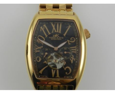 Adee Kaye, Beverley Hills. A gentleman's gilt metal automatic wristwatch, having a Roman and Arabic engine turned dial, set d