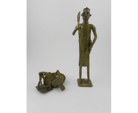 A metal sculpture of a man, standing full length with pitch fork, H.16cm, together with a metal ash tray