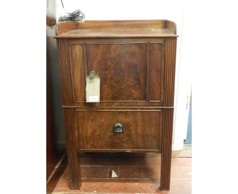 A George III mahogany night table, with gallery top above a cupboard door, with commode drawer below. 