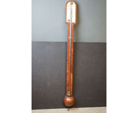 An antique mahogany stick barometer by King of Bristol af. 