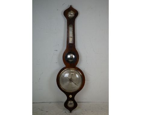 An antique mahogany banjo barometer. 