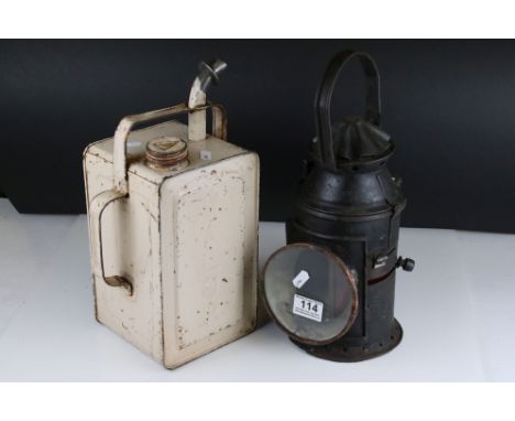 A vintage black railway warning lantern together with a valour fuel can. 