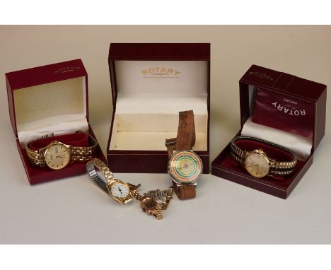 Two boxed gents Rotary watches together with a map mileage measurer and a ladies watch. 