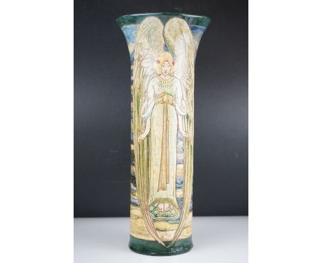 A large Art Nouveau Della Robbia Pottery Cylindrical vase decorated with Angels by Cassandia Anni Walker initialled to unders