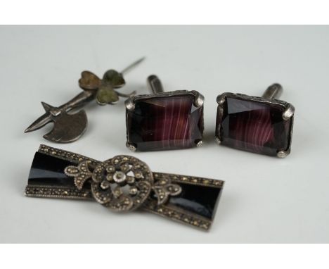 A small collection of vintage white metal jewellery to include Cufflinks and brooches. 