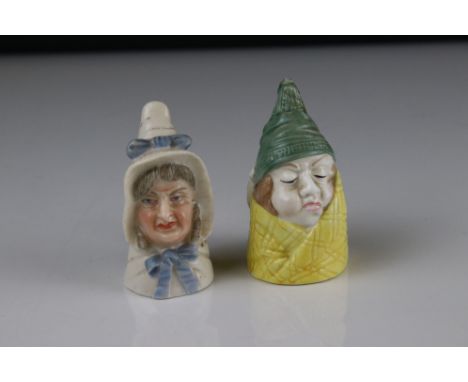 Two Royal Worcester Candle Snuffers including woman in bonnet with puce mark and Mr Caudle 1976.