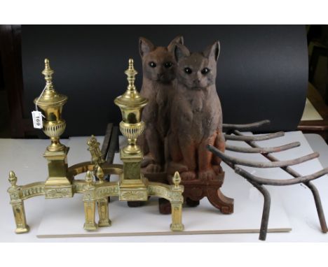 Pair of Cast Iron Andirons in the form of Cats with Green Glass Eyes by designer 'Hood', 43cms high together with a Fire Grat