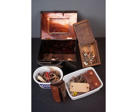 A collection of vintage keys and locks. 