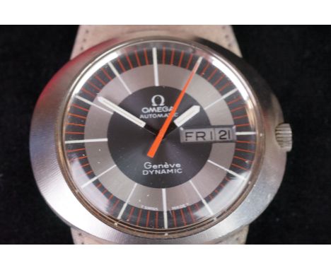 A vintage gents Omega Geneve Dynamic day / date automatic watch with original strap. 