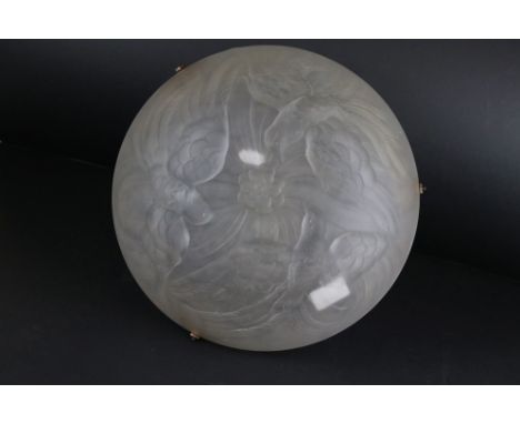 An antique glass decorative ceiling light shade with bird decoration. 