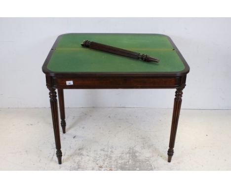 George IV simulated rosewood card table, circa 1825, in the manner of Gillows, the folding top enclosing a baize playing surf