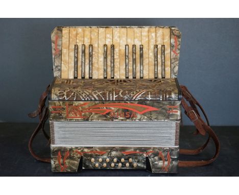 A vintage German Piosa accordion. 