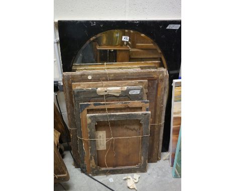 Large vintage, ebonized, framed oval bevel glass mirror, together with antique picture backboards 