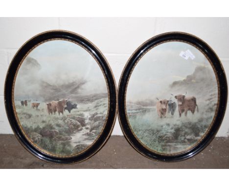 PAIR OF OVAL GILT TRIMMED BLACK FRAMES EACH CONTAINING A PRINT OF CATTLE 