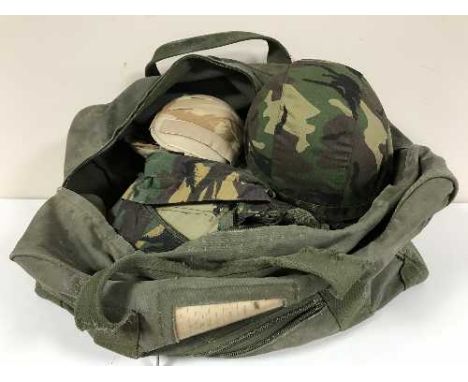 A holdall containing assorted DP army clothing and bags