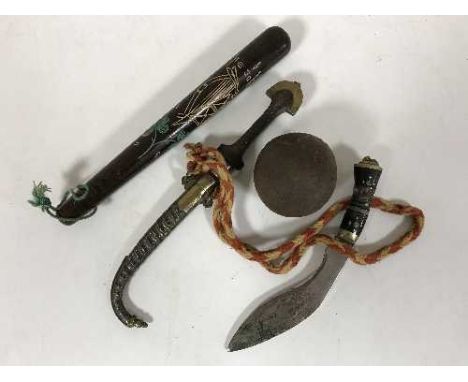 A basket of Irish baton, mini Kukri knife, an eastern style dagger in sheath and a shot 