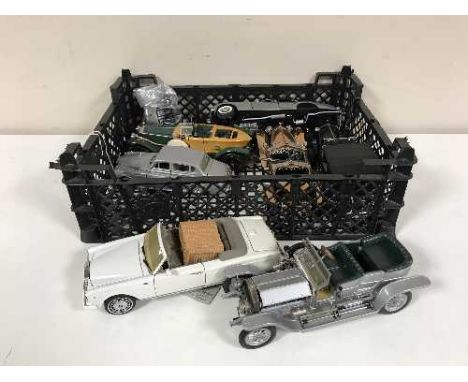 A crate containing seven large scale die cast vehicles including a 1907 Rolls Royce Silver Ghost by Franklin Mint, 1953 Rolls