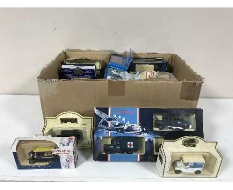 A box containing assorted boxed die cast vehicles including Lledo, Days Gone By, Corgi etc, military vehicles and delivery va