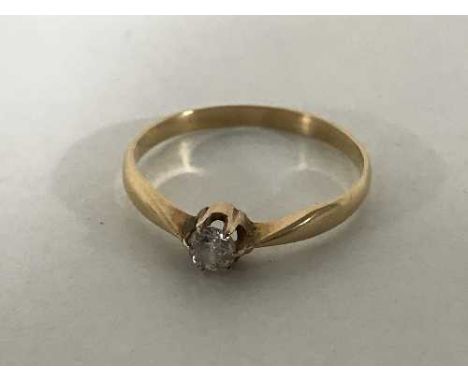 An 18ct gold diamond solitaire ring, 0.15 carat