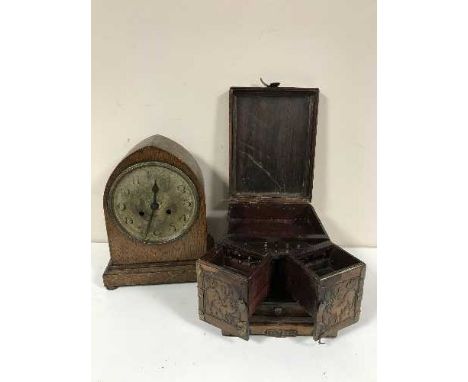 An Oriental hardwood table casket, together with an early 20th century oak dome top mantel clock with silvered dial